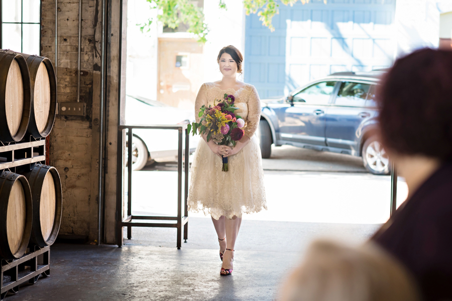 A bride walks into a bar to meet her groom.
